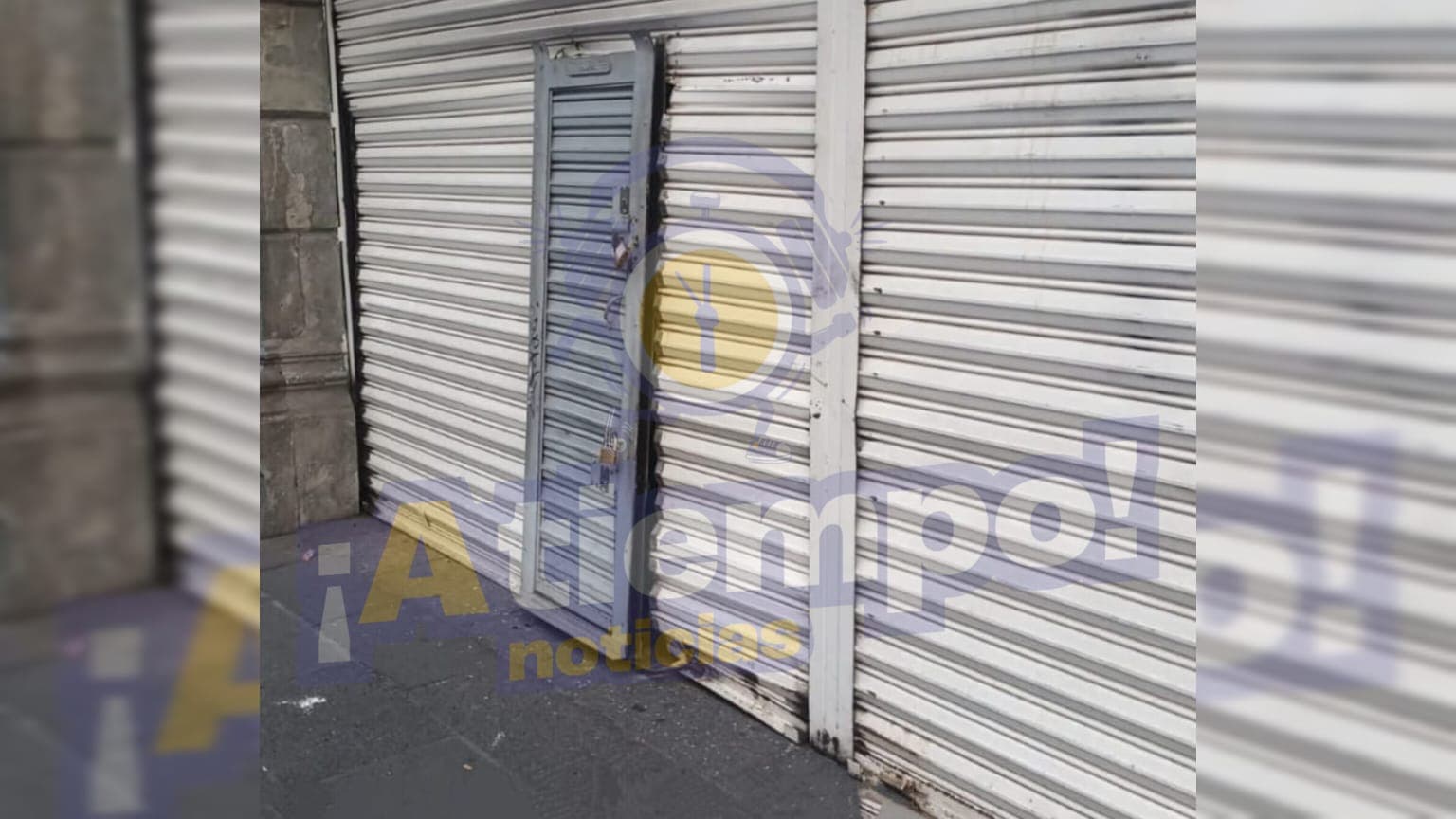 Cortinazo a tienda deportiva en el centro de Puebla