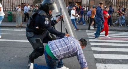 Investigan agresión de policía durante protesta en Palacio de Gobierno de Michoacán